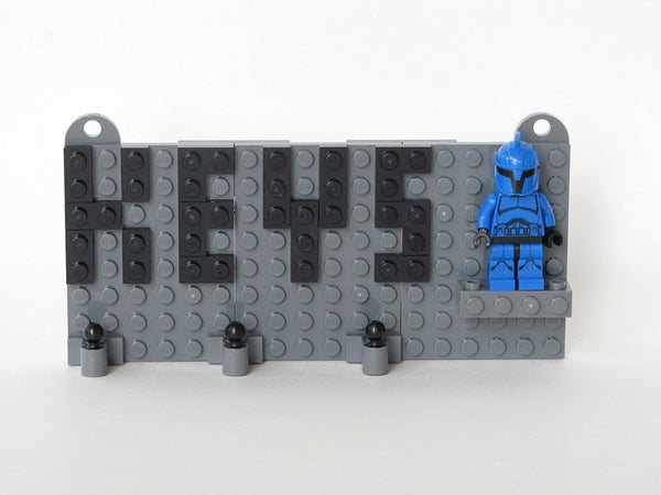 Grey Toy Brick Key Organizer with Black Letters and a Star Wars Senate Commando Minifigure